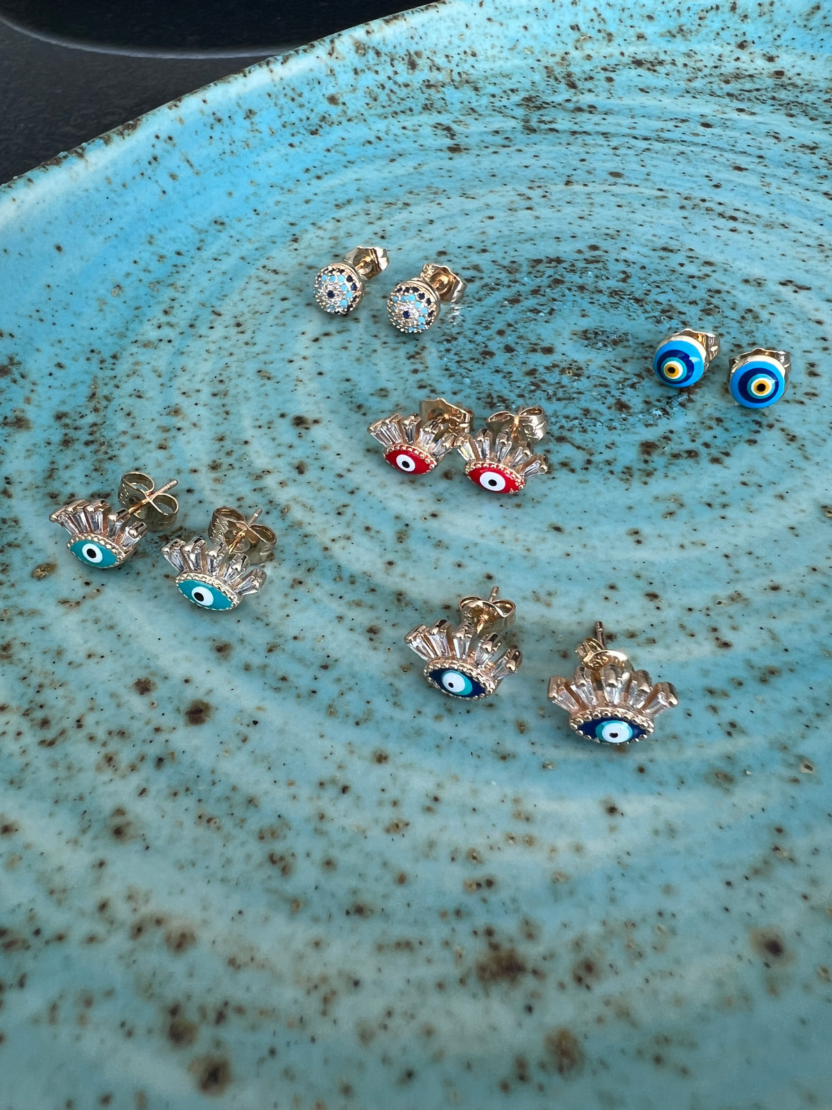 See No Evil Turkish evil eye gold stud earrings at Yoga Republik Canggu Bali