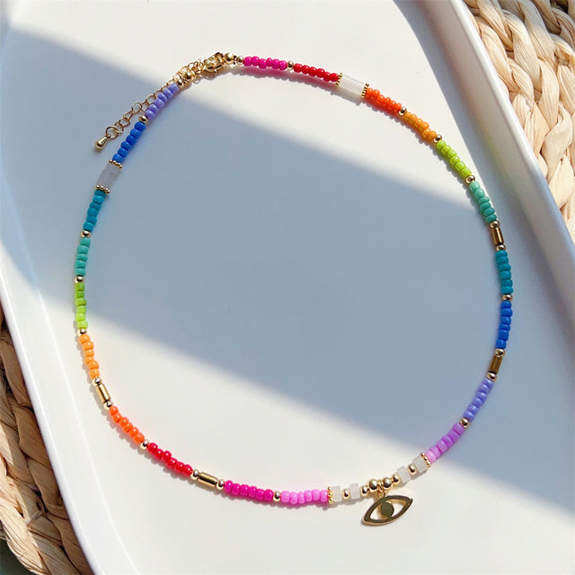 See No Evil evil eye heart charm rainbow bead necklace choker at Yoga Republik Bali