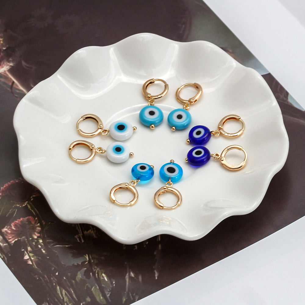 See No Evil Turkish evil eye dangling earrings at Yoga Republik Canggu Bali