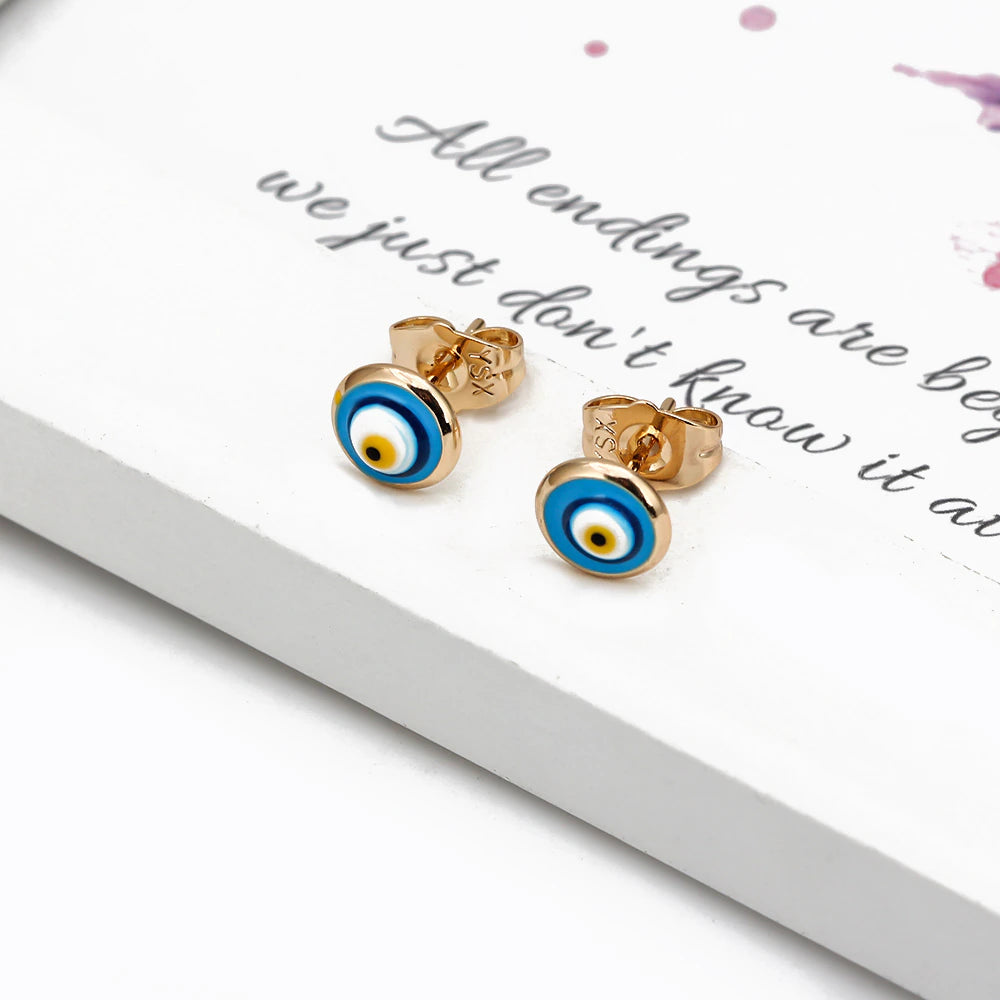 See No Evil Turkish evil eye gold stud earrings at Yoga Republik Canggu Bali