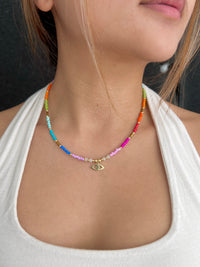 See No Evil evil eye heart charm rainbow bead necklace choker at Yoga Republik Bali
