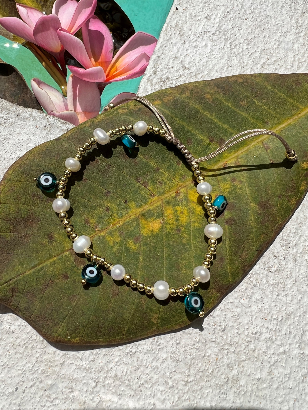 See No Evil evil eye charm gold beads bracelet at Yoga Republik Canggu Bali