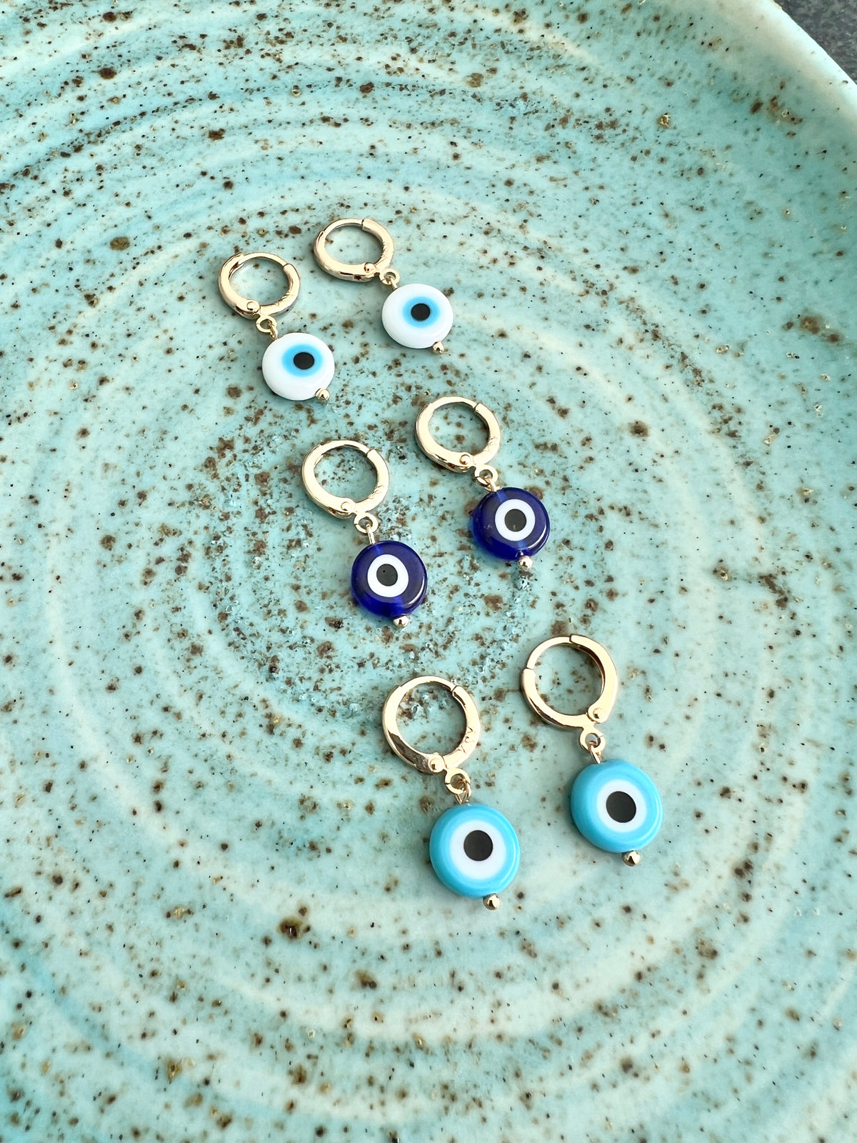 See No Evil Turkish evil eye dangling earrings at Yoga Republik Canggu Bali