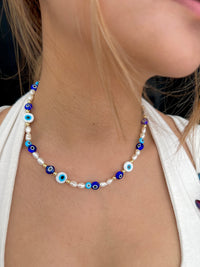 See No Evil evil eyes freshwater pearl necklace choker at Yoga Republik Canggu Bali