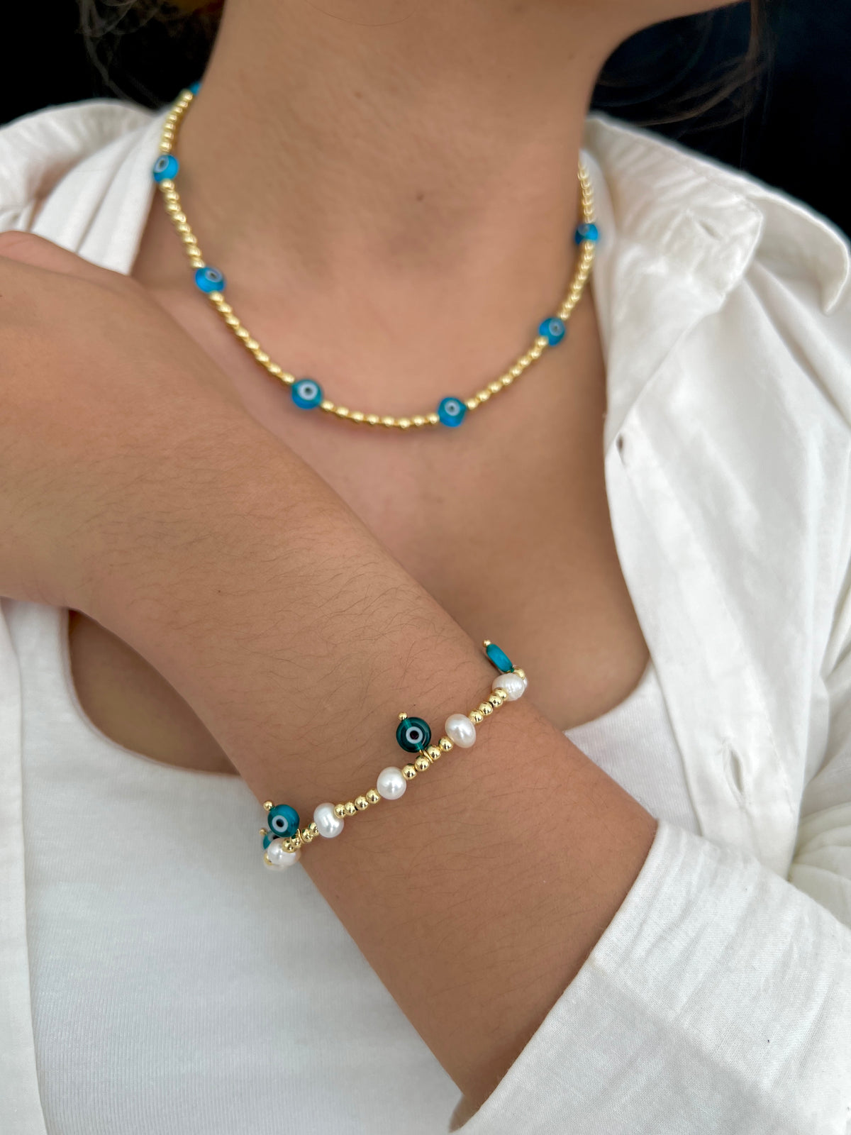 See No Evil evil eye charm gold beads bracelet at Yoga Republik Canggu Bali