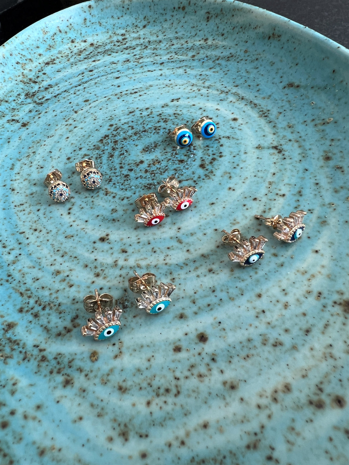 See No Evil Turkish evil eye gold stud earrings at Yoga Republik Canggu Bali