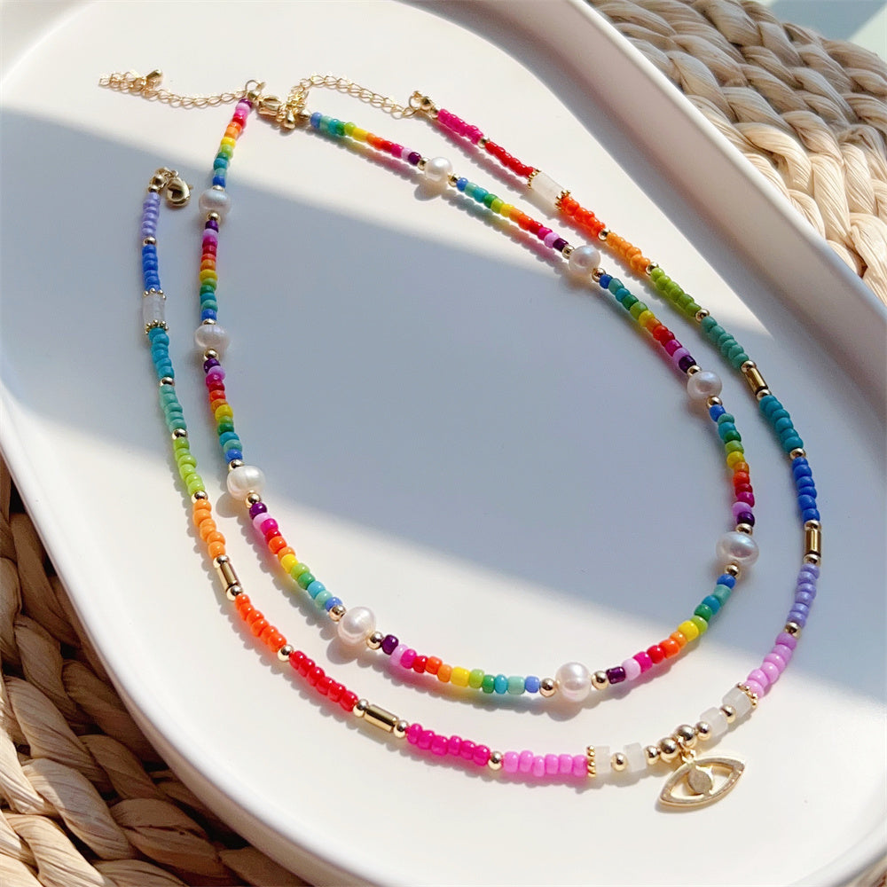 See No Evil evil eye heart charm rainbow bead necklace choker at Yoga Republik Bali