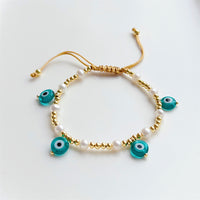 See No Evil evil eye charm gold beads bracelet at Yoga Republik Canggu Bali