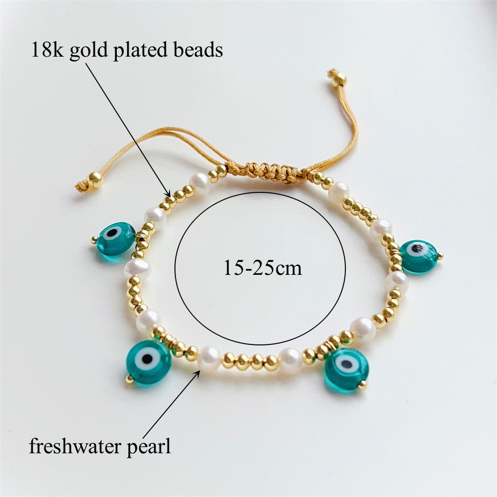 See No Evil evil eye charm gold beads bracelet at Yoga Republik Canggu Bali