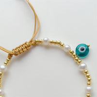 See No Evil evil eye charm gold beads bracelet at Yoga Republik Canggu Bali