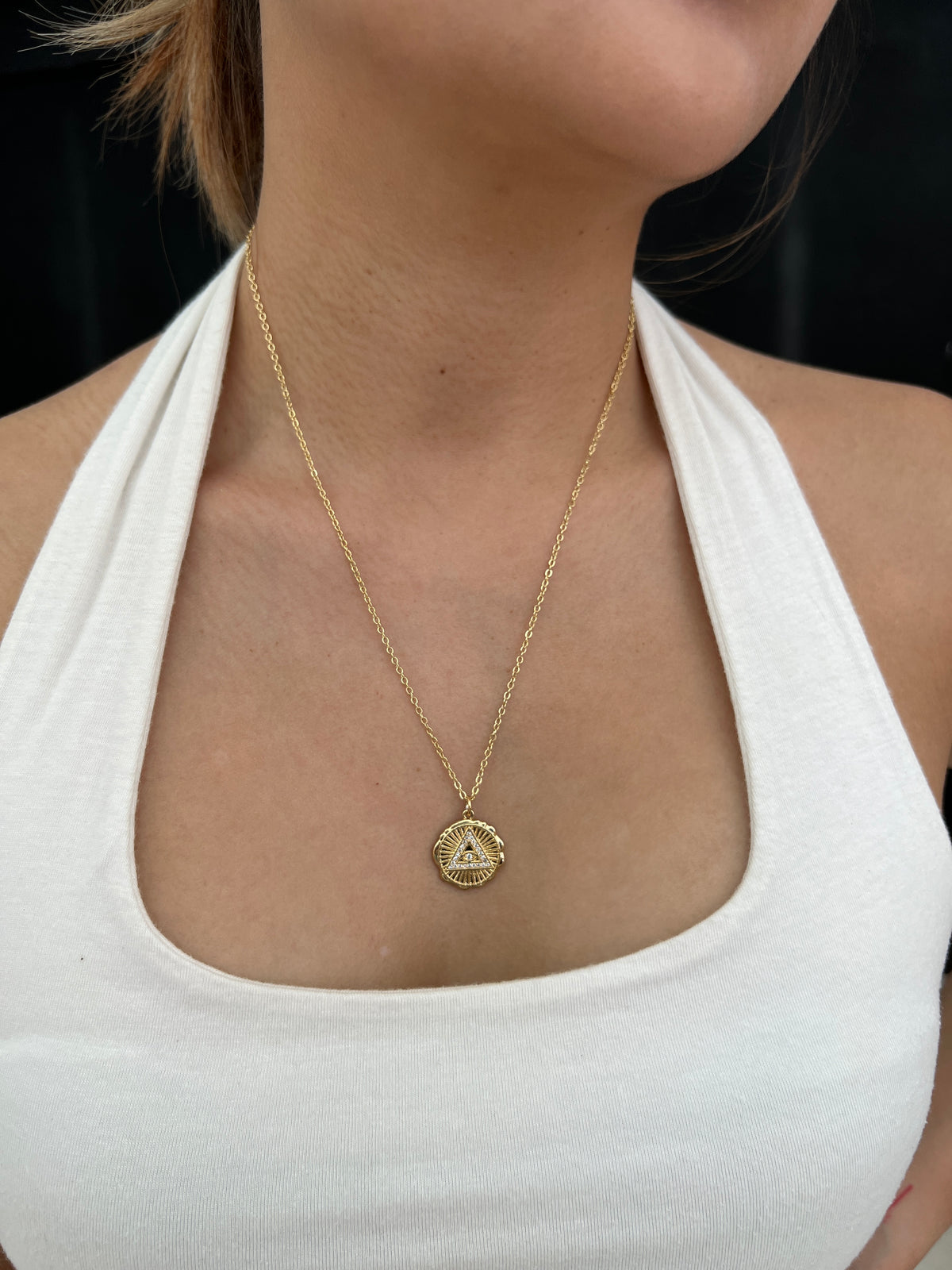 See No Evil gold triangle evil eye pendant chain at Yoga Republik Canggu Bali