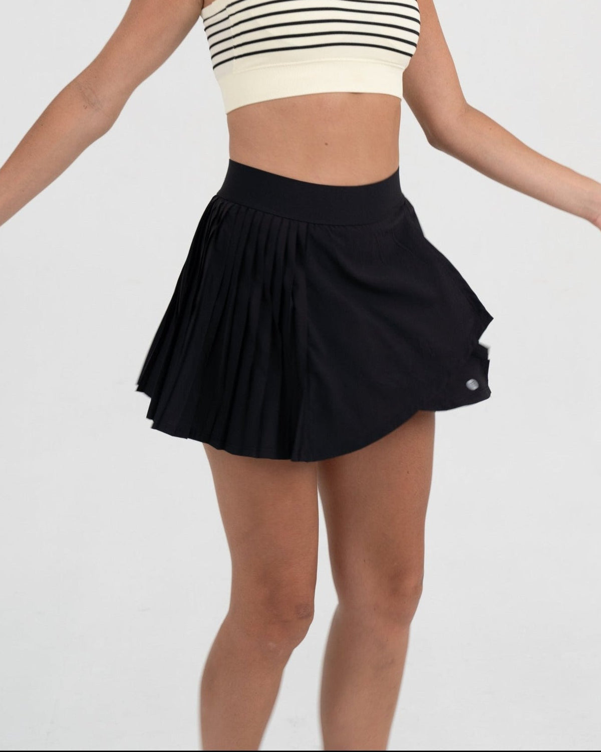 YR Lucy Tennis Skirt black pleated at Yoga Republik Canggu Bali