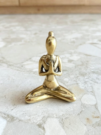 YR Bys handmade gold brass Namaste Hands yoga pose meditation statue at Yoga Republik Bali Indonesia