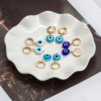See No Evil Turkish evil eye dangling earrings at Yoga Republik Canggu Bali