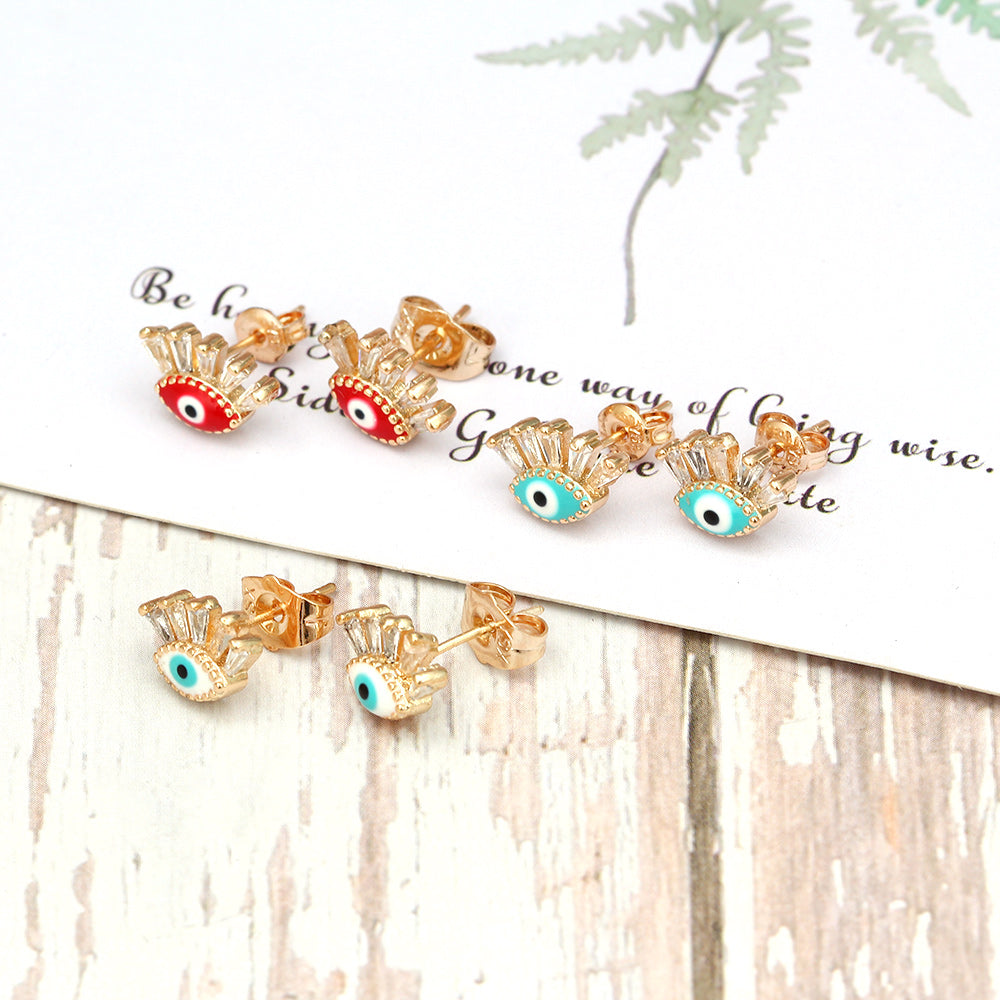 See No Evil Turkish evil eye gold stud earrings at Yoga Republik Canggu Bali