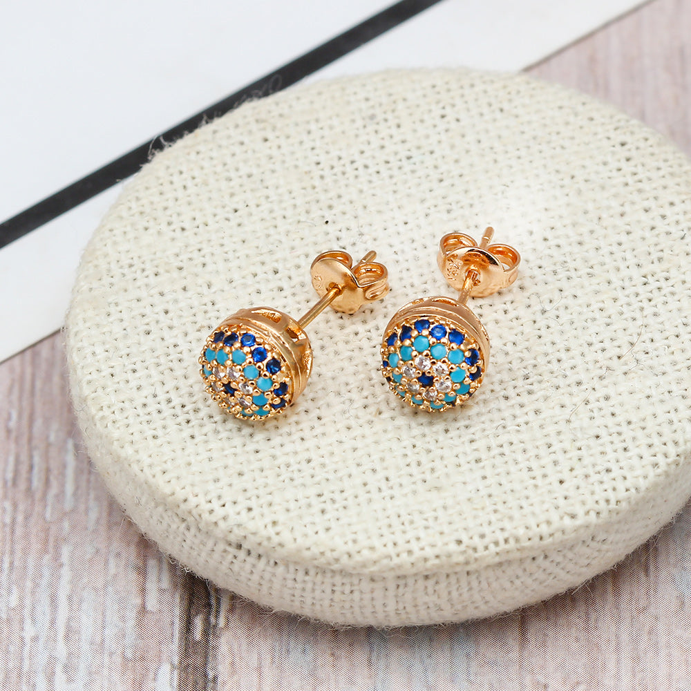 See No Evil Turkish evil eye gold stud earrings at Yoga Republik Canggu Bali