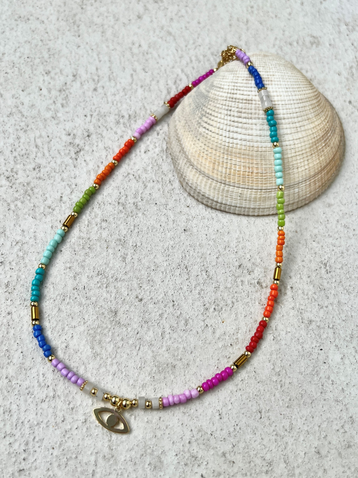 See No Evil evil eye heart charm rainbow bead necklace choker at Yoga Republik Bali