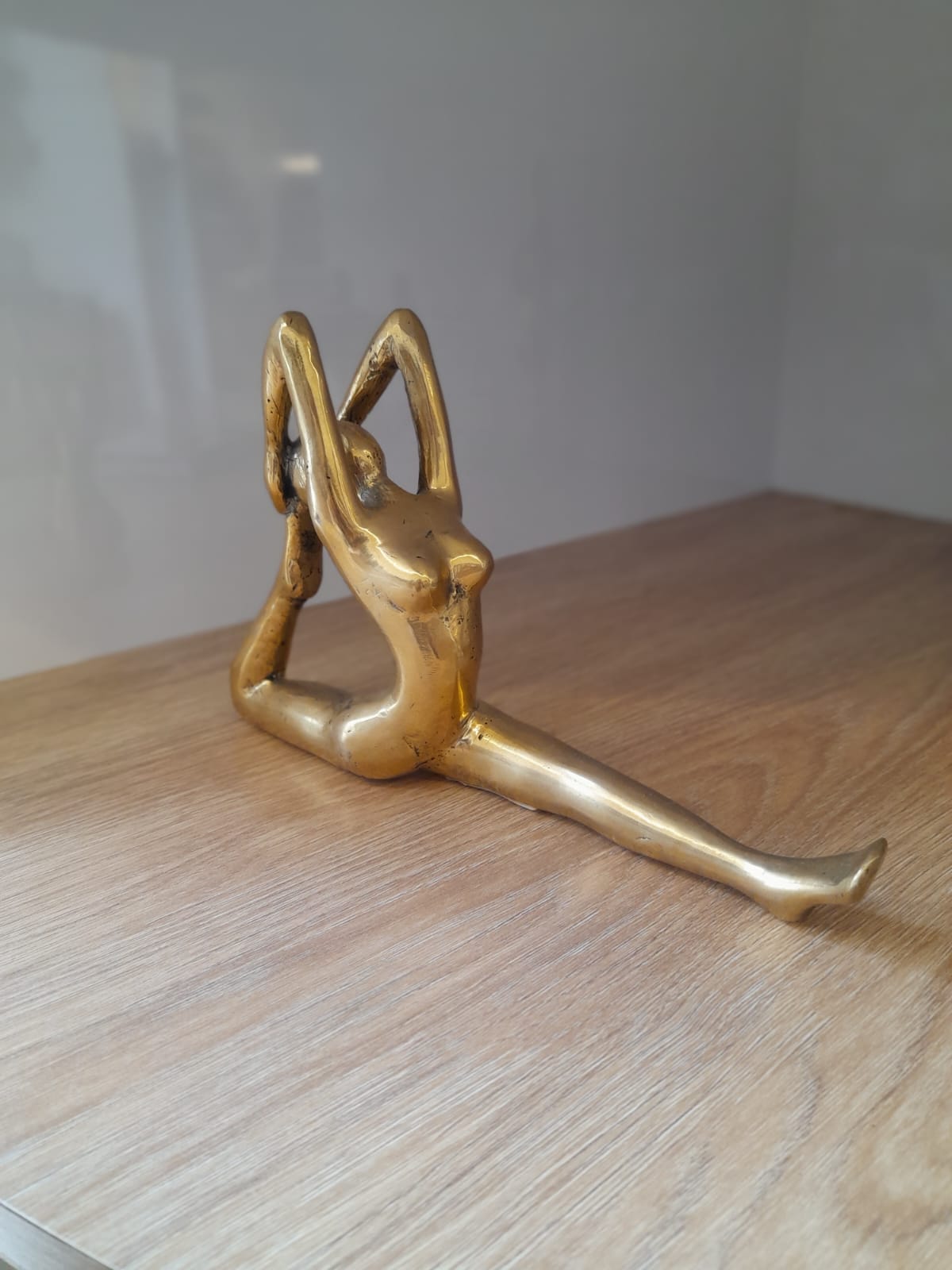 Handmade gold brass Backbend LS yoga pose statue at Yoga Republik Canggu Bali