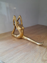 Handmade gold brass Backbend LS yoga pose statue at Yoga Republik Canggu Bali